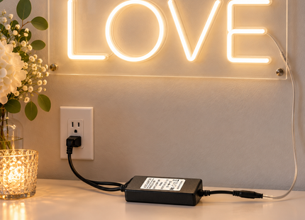 Illustration of wall adapter powering a compatible LED sign; sign not included